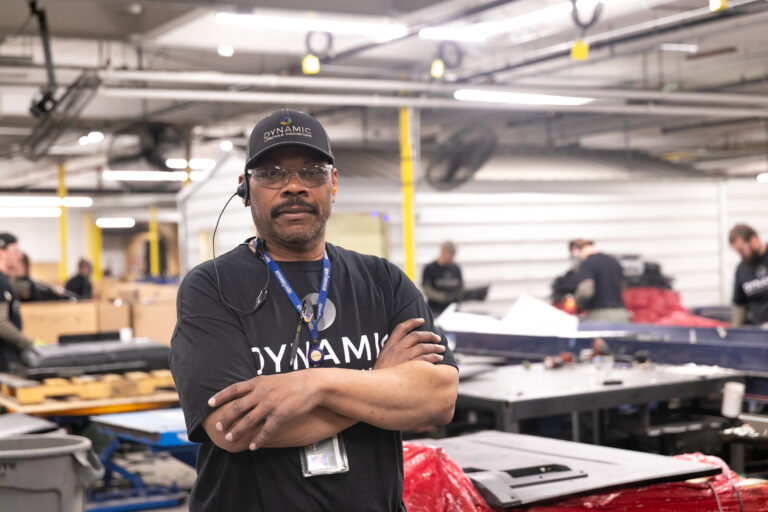 Dynamic Lifecycle Innovations employee in the electronics recycling facility.