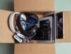 Electronics in a box for recycling during a spring cleaning session.