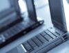 Company laptops lined up to be sent to a remote workforce.