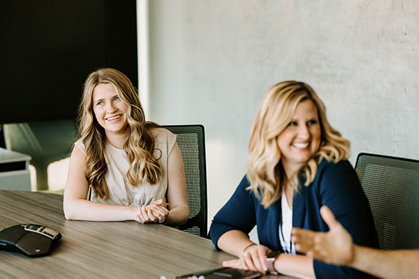 Amanda and Haley in a meeting at Dynamic Lifecycle Innovations in Onalaska, Wisconsin.