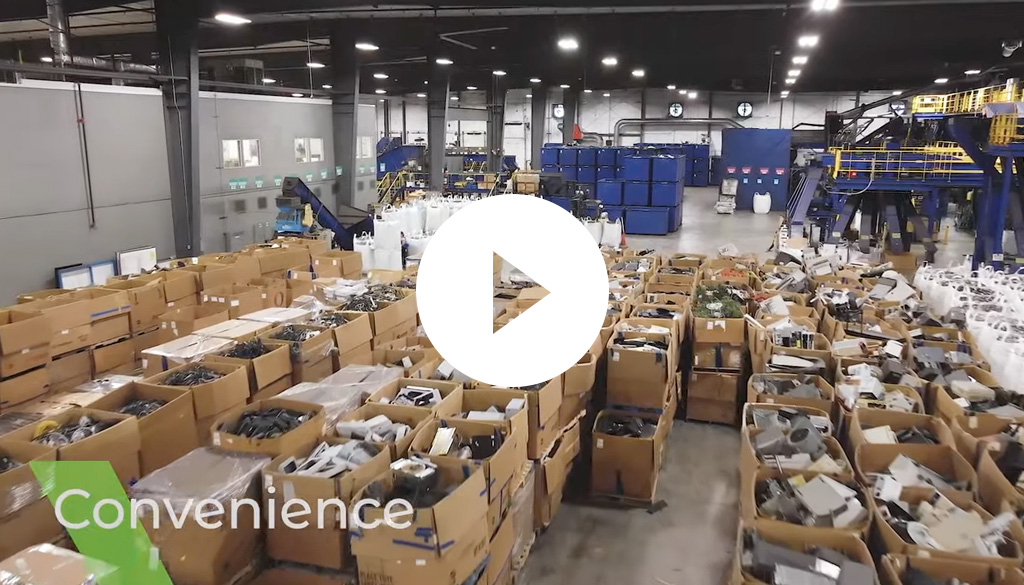 Boxes of electronics in the Dynamic's recycling facility.